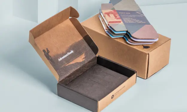 Printed corrugated mailers and paper inserts