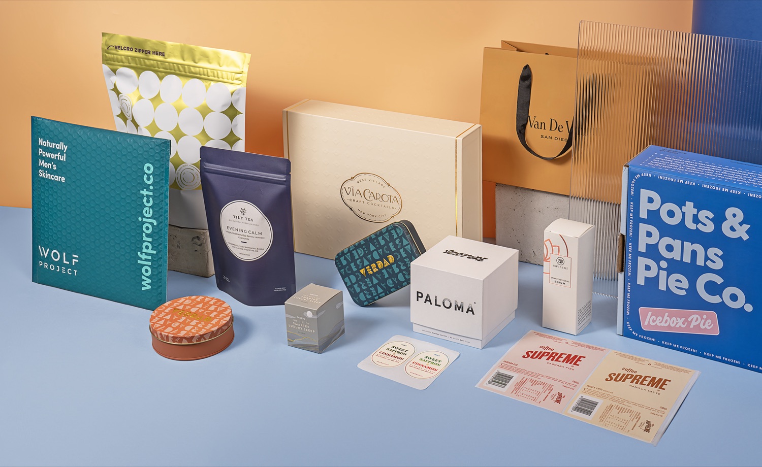An assortment of printed retail boxes, pouches, bags and labels